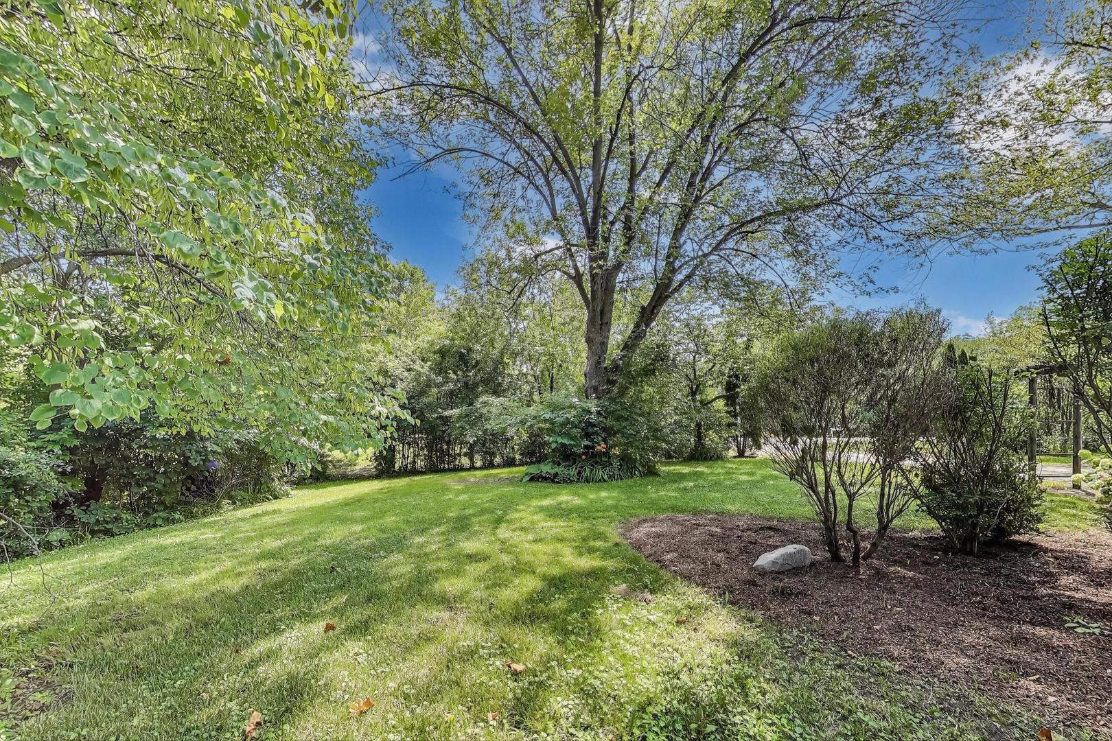 222 Bradwell Road Inverness, IL 60010 - Photo 5 of 46 a view of a field with a tree