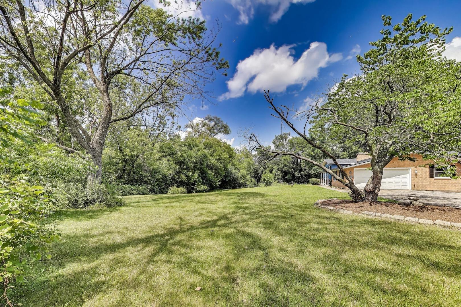 222 Bradwell Road Inverness, IL 60010 - Photo 6 of 46 a view of a tree with a yard