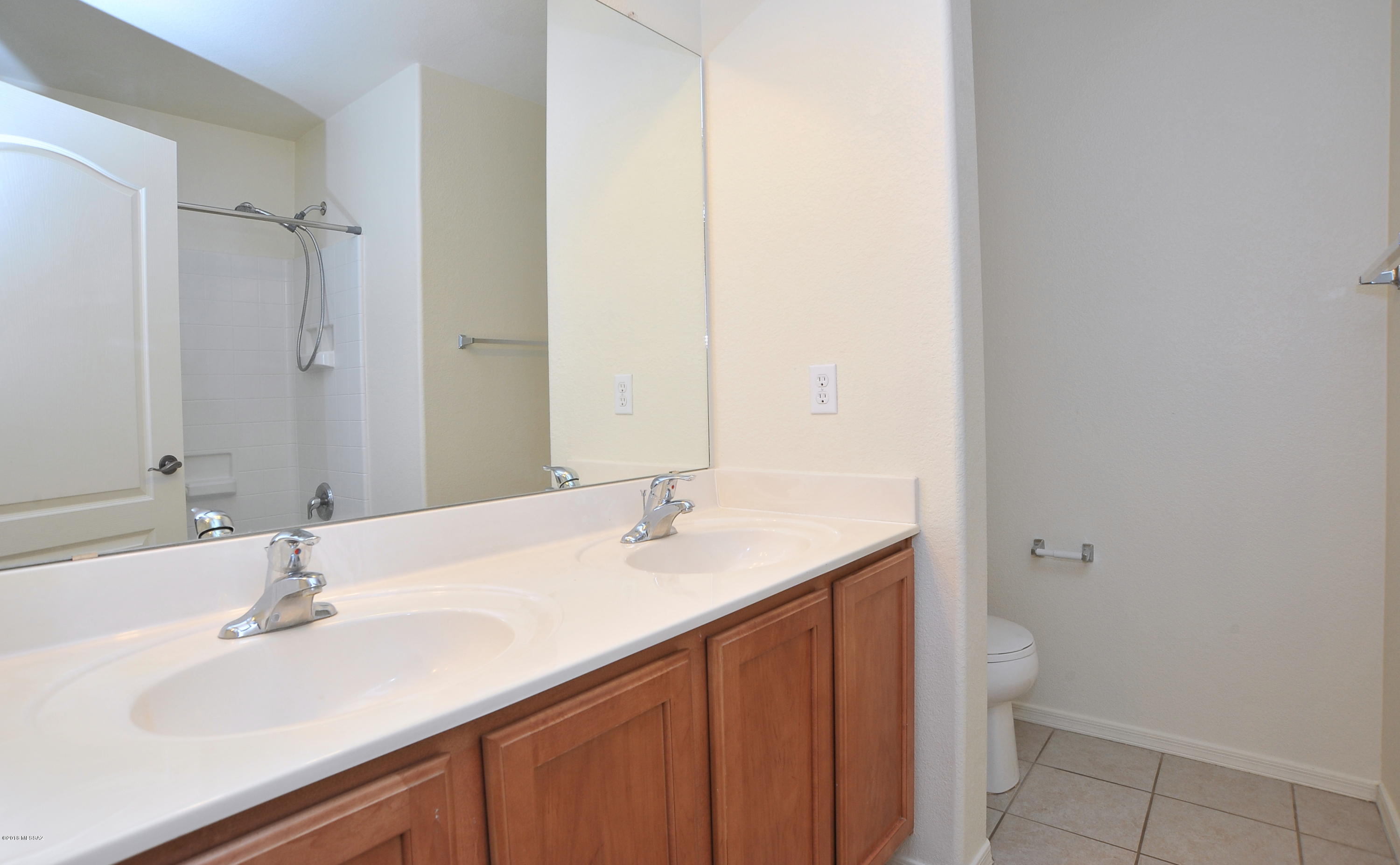 558 West Chatfield Street Vail, AZ 85641 - Photo 23 of 31 a bathroom with a sink and a toilet