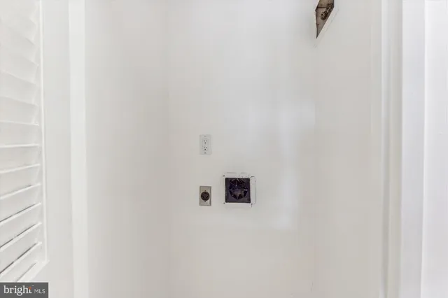 a view of balcony with furniture