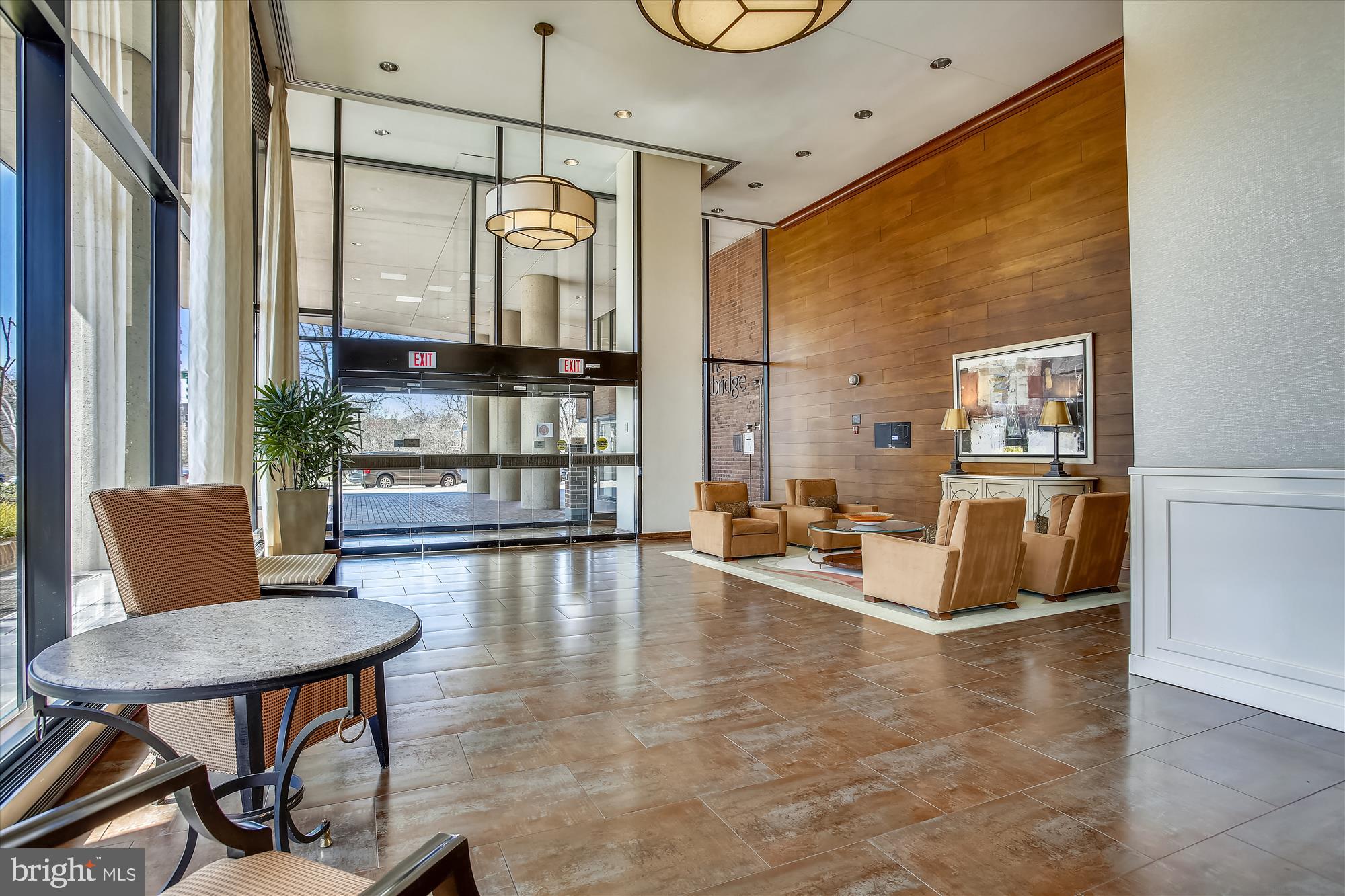 2555 Pennsylvania Avenue Northwest, Unit 816 Washington, DC 20037 - Photo 39 of 54 a living room with furniture and a floor to ceiling window