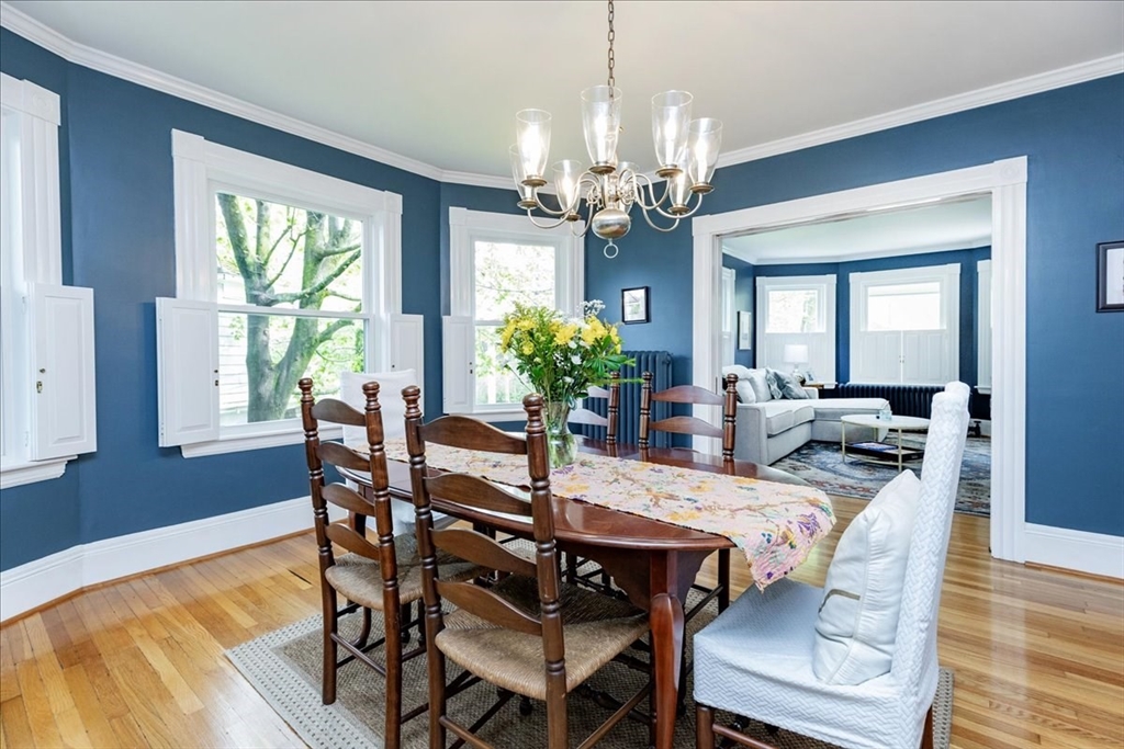 44 Baker Avenue, Unit 1 Beverly, MA 01915 - Photo 12 of 29 a view of a dining room with furniture window and wooden floor