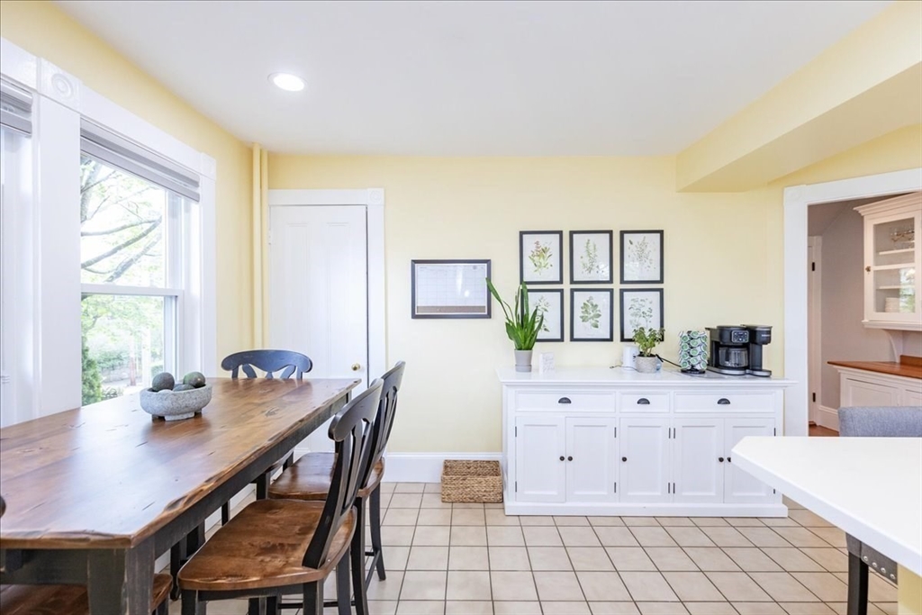 44 Baker Avenue, Unit 1 Beverly, MA 01915 - Photo 16 of 29 a view of a dining room with furniture and window