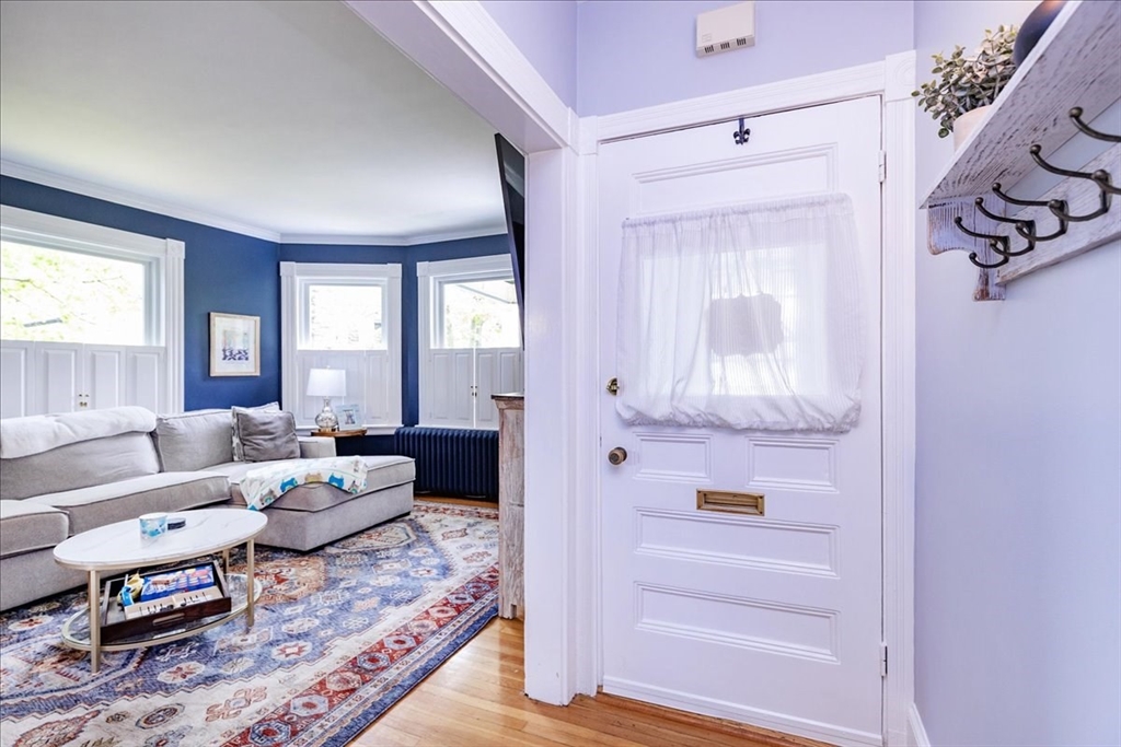44 Baker Avenue, Unit 1 Beverly, MA 01915 - Photo 6 of 29 a living room with furniture and a window