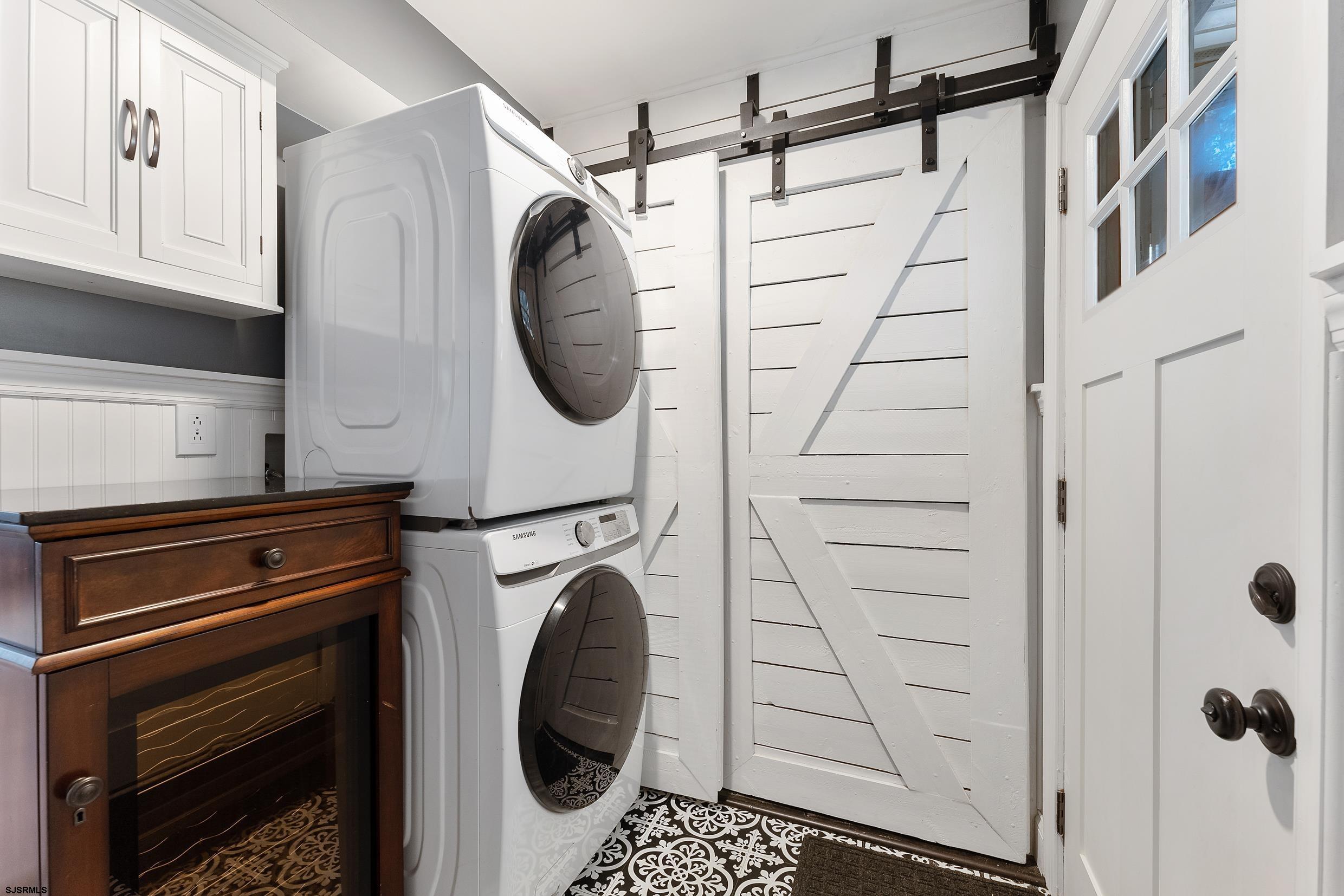 305 East Ridgewood Avenue Galloway Township, NJ 08205 - Photo 27 of 54 a utility room with dryer and washer