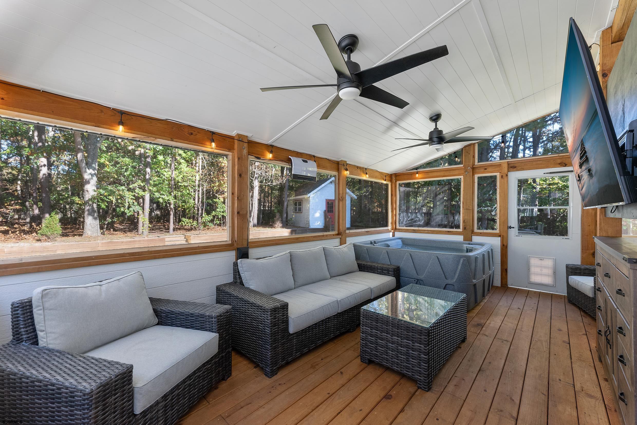 305 East Ridgewood Avenue Galloway Township, NJ 08205 - Photo 28 of 54 a living room with furniture and a large window
