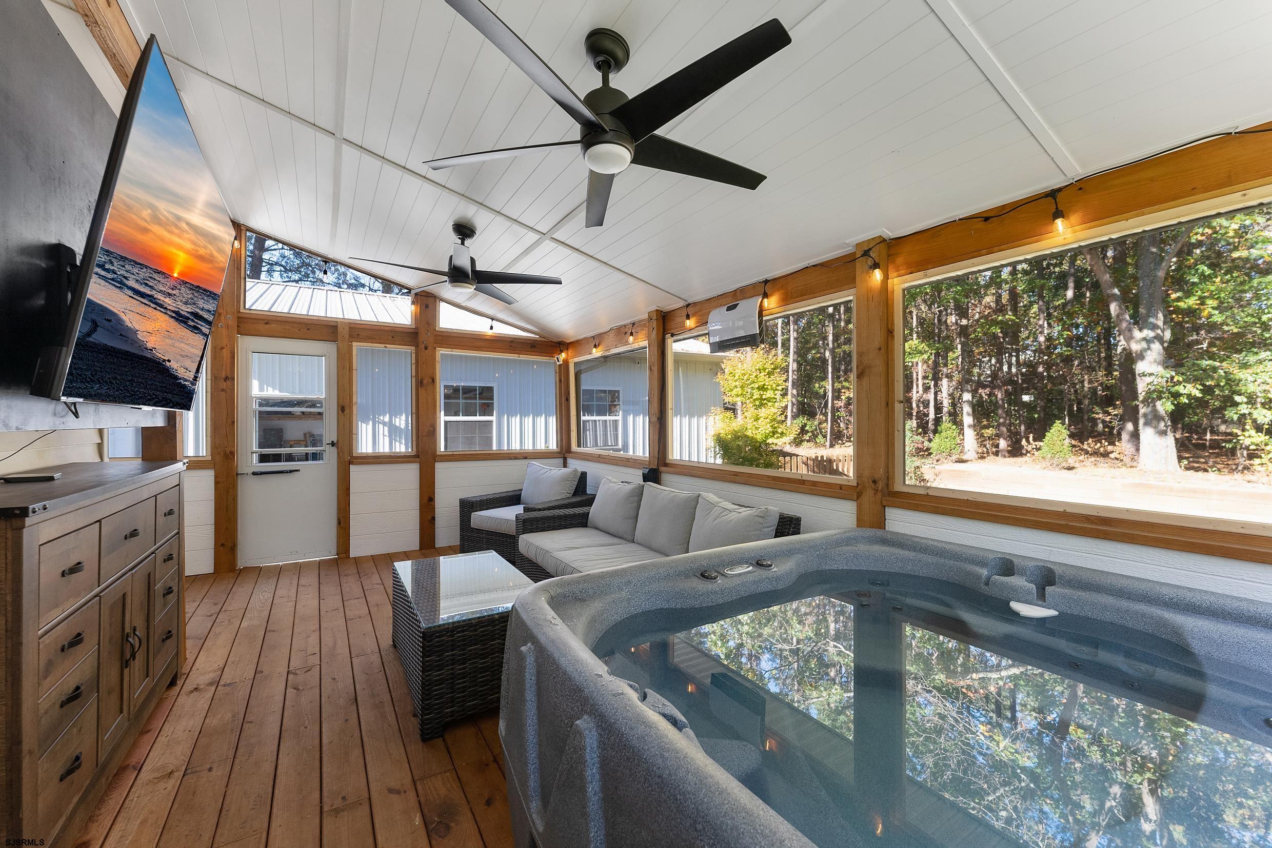 305 East Ridgewood Avenue Galloway Township, NJ 08205 - Photo 30 of 54 a living room with large window