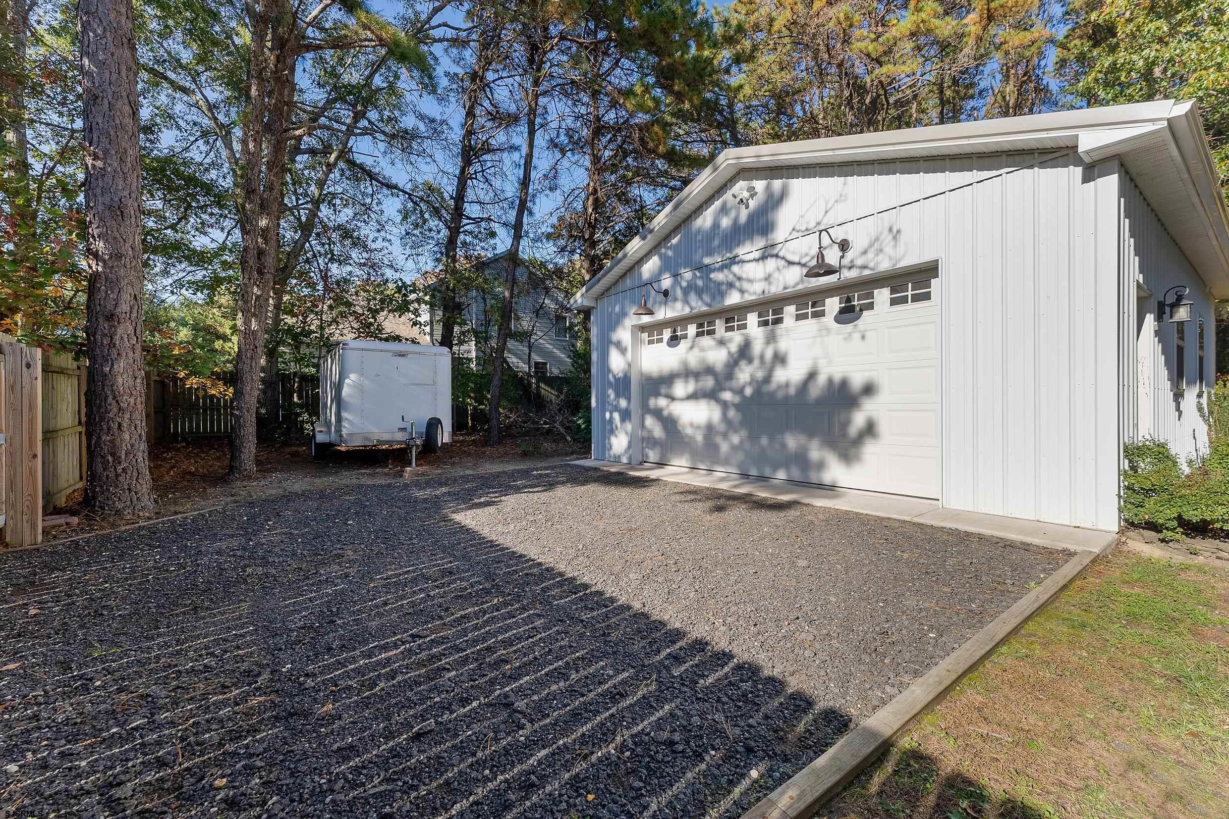 305 East Ridgewood Avenue Galloway Township, NJ 08205 - Photo 32 of 54 a view of a back yard of the house