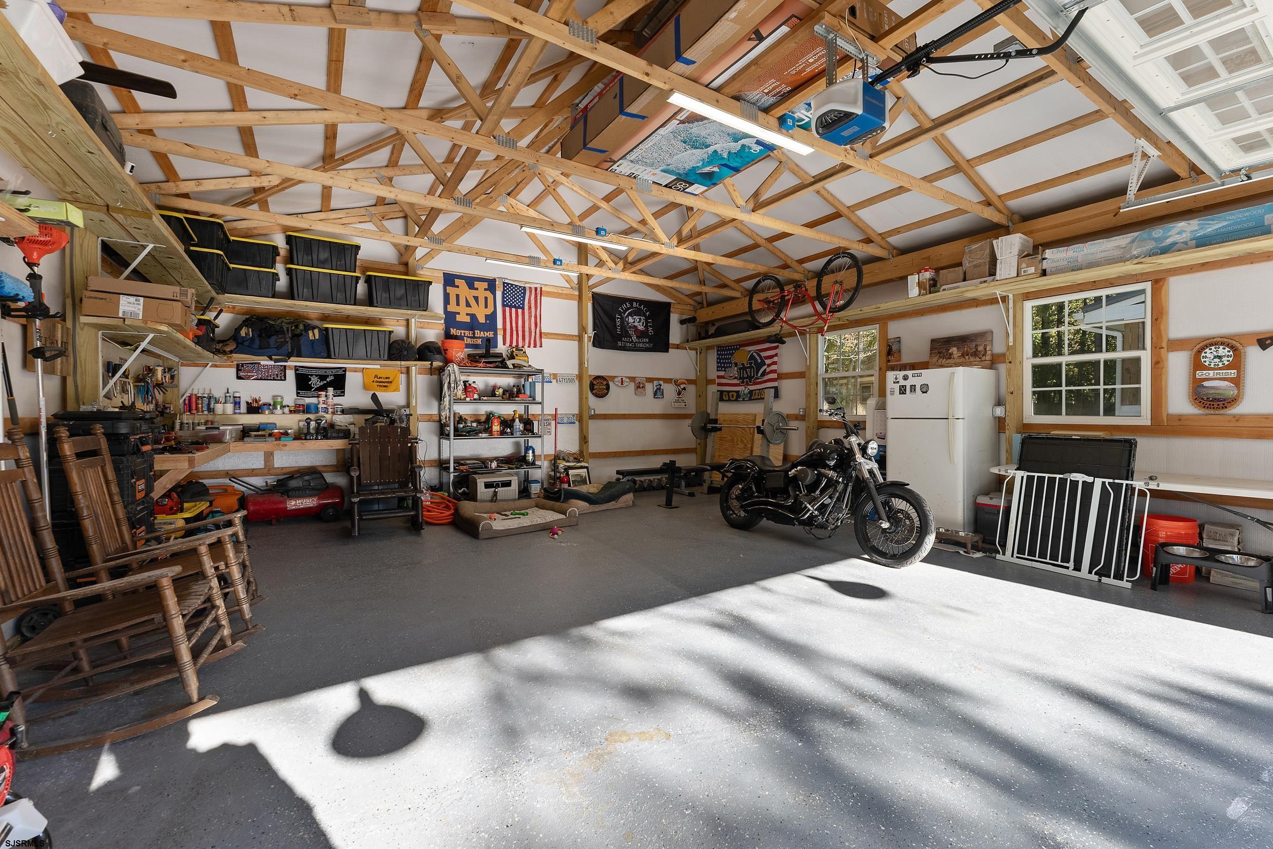 305 East Ridgewood Avenue Galloway Township, NJ 08205 - Photo 34 of 54 a view of a garage with furniture