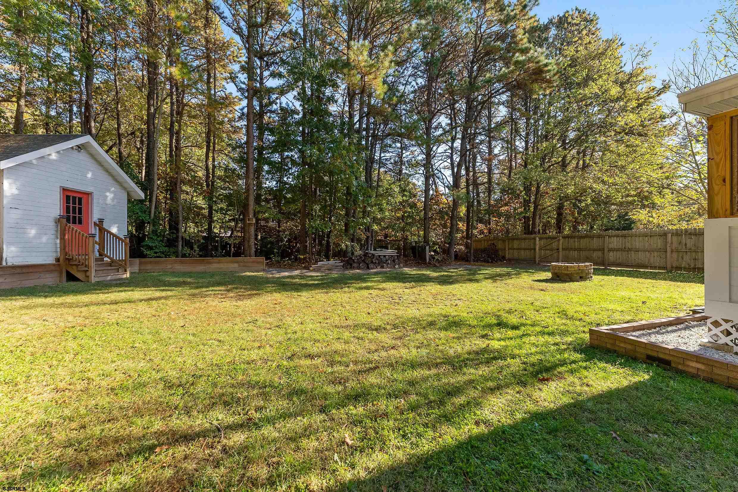 305 East Ridgewood Avenue Galloway Township, NJ 08205 - Photo 38 of 54 a view of swimming pool with an outdoor space