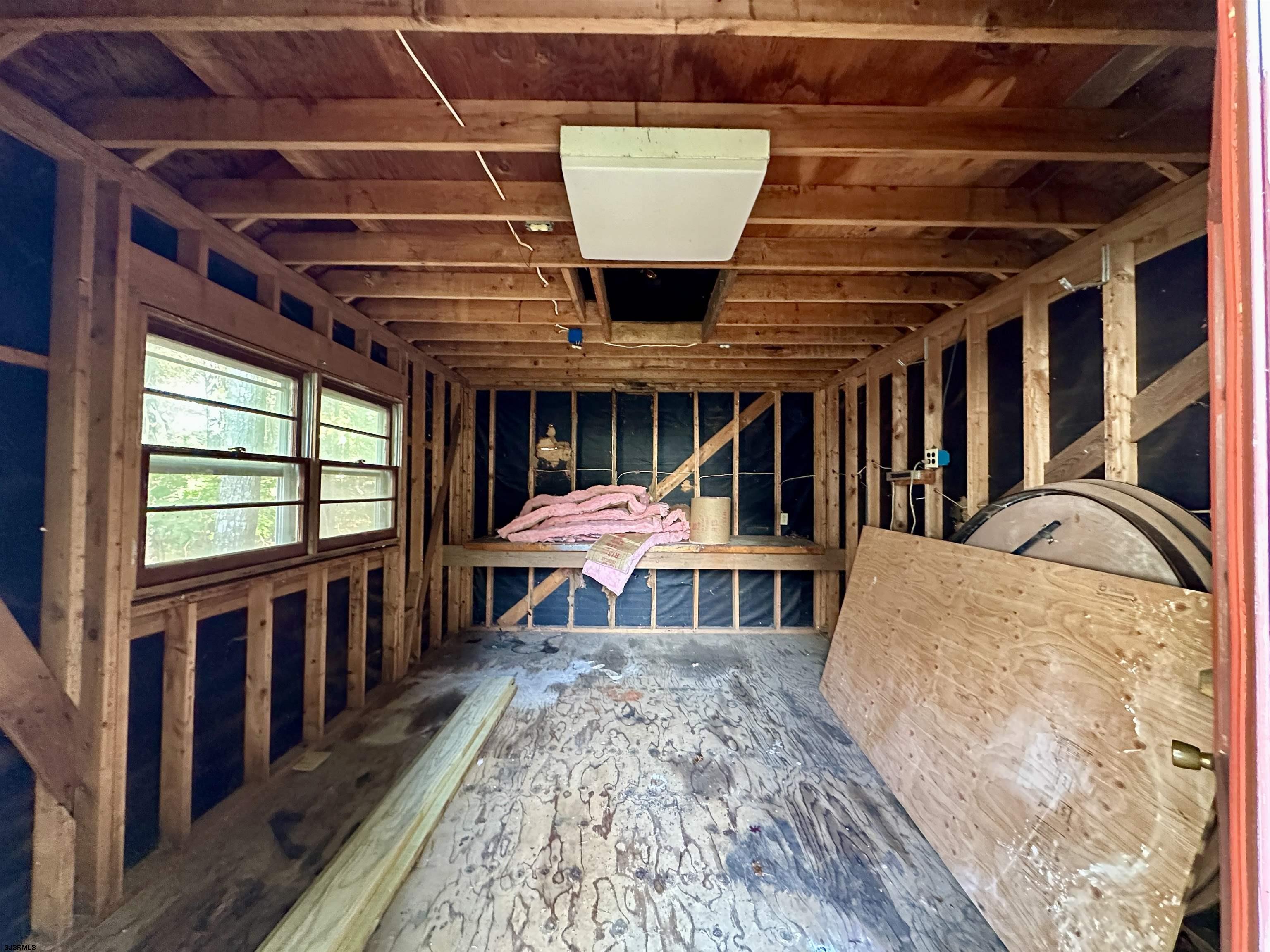 305 East Ridgewood Avenue Galloway Township, NJ 08205 - Photo 54 of 54 a view of a room with wooden floor and furniture