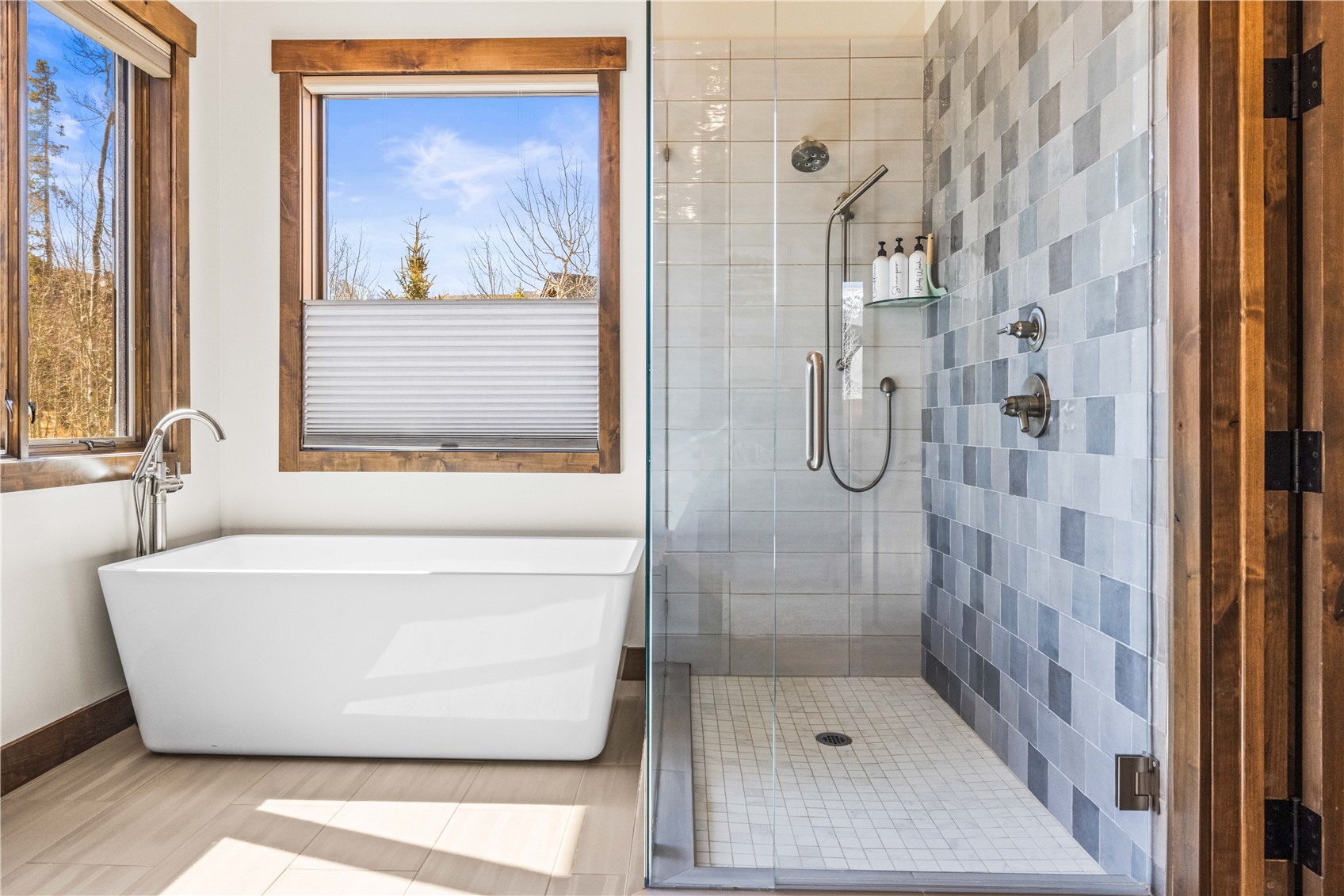 230 Game Trail Road Silverthorne, CO 80498 - Photo 35 of 43 a white bath tub sitting next to a shower