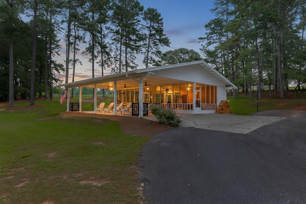 986 Austin Road Winder, GA 30680 - Photo 102 of 135 a front view of a house with garden