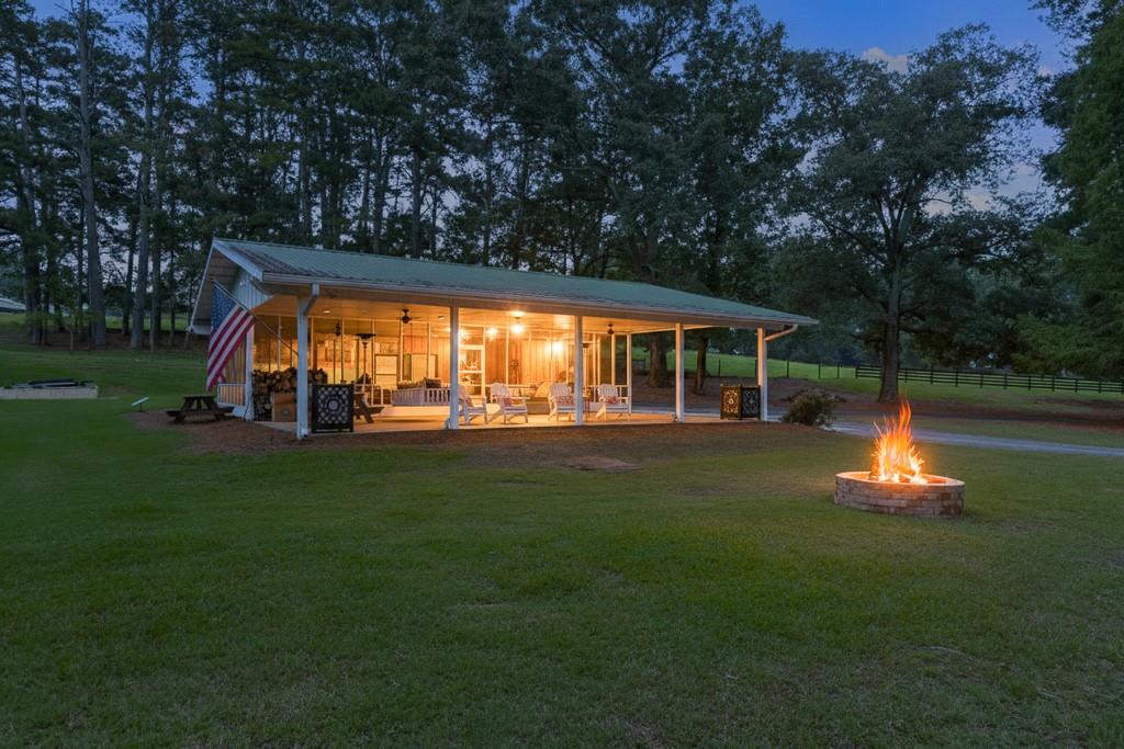 986 Austin Road Winder, GA 30680 - Photo 103 of 135 a view of backyard with swimming pool and deck