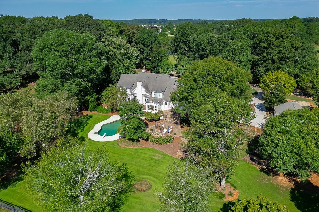 986 Austin Road Winder, GA 30680 - Photo 128 of 135 an aerial view of a house with a yard