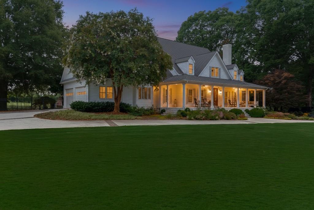 986 Austin Road Winder, GA 30680 - Photo 133 of 135 a front view of house with yard and green space