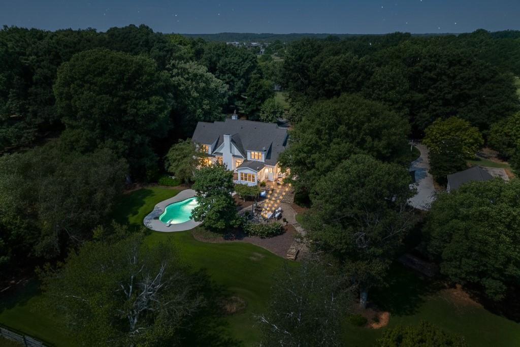 986 Austin Road Winder, GA 30680 - Photo 134 of 135 an aerial view of a house with pool yard outdoor and green space