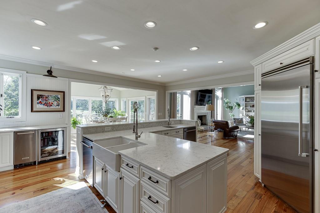 986 Austin Road Winder, GA 30680 - Photo 25 of 135 a kitchen with stainless steel appliances granite countertop a sink stove and refrigerator