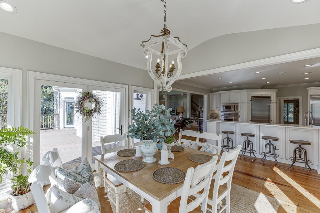 986 Austin Road Winder, GA 30680 - Photo 38 of 135 a view of a dining room with furniture wooden floor and chandelier