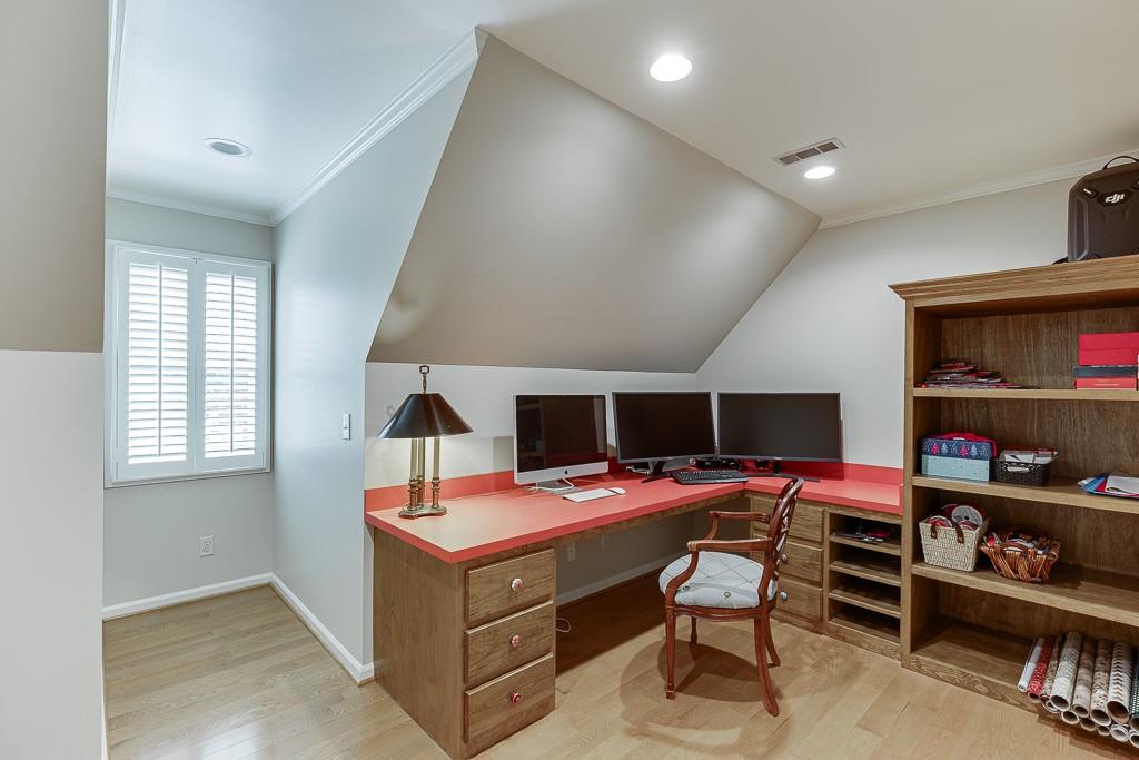 986 Austin Road Winder, GA 30680 - Photo 53 of 135 a room with furniture a flat screen tv and a window