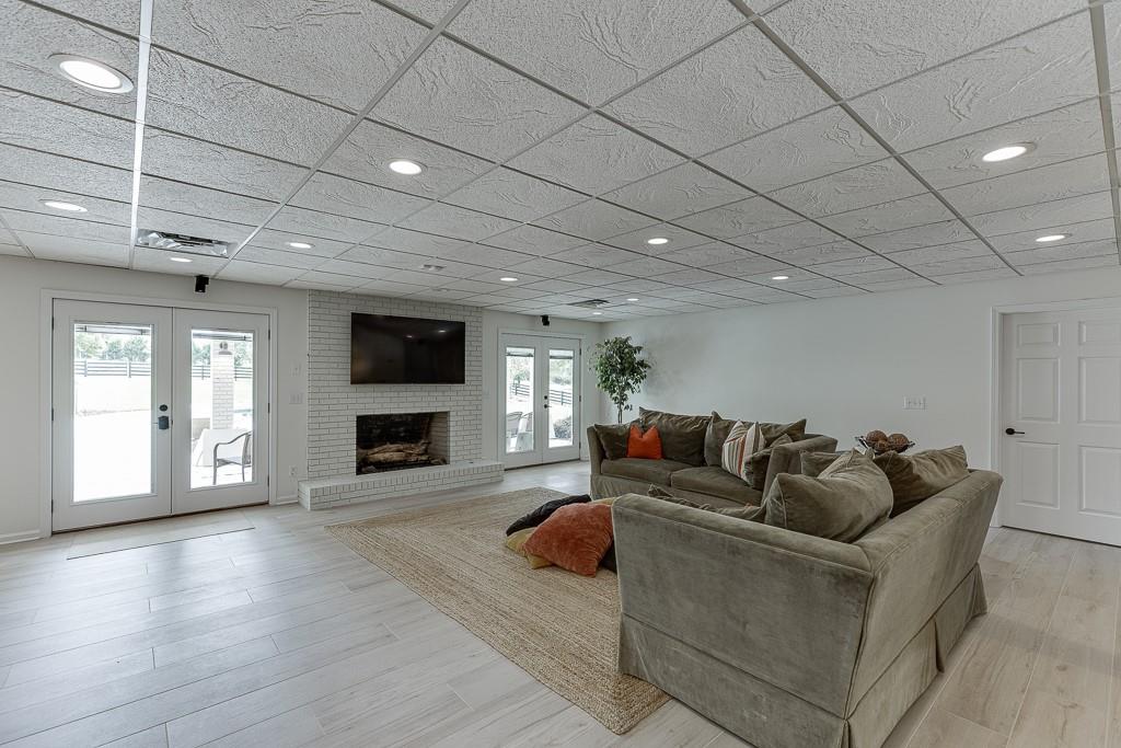 986 Austin Road Winder, GA 30680 - Photo 77 of 135 a living room with furniture and a fireplace