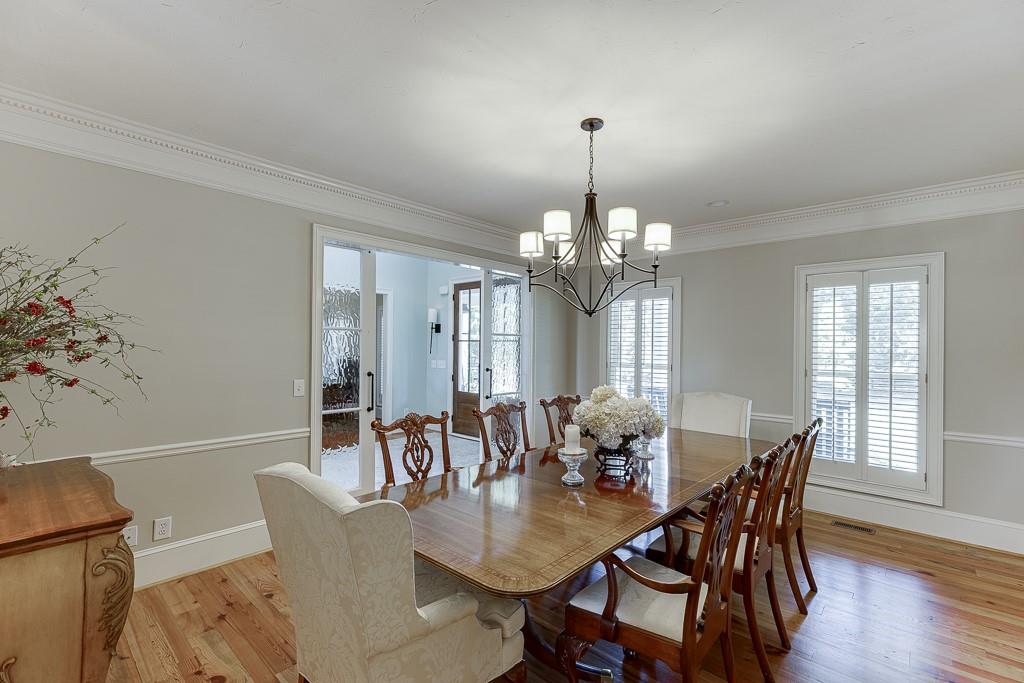 986 Austin Road Winder, GA 30680 - Photo 8 of 135 a view of a dining room with furniture window and wooden floor