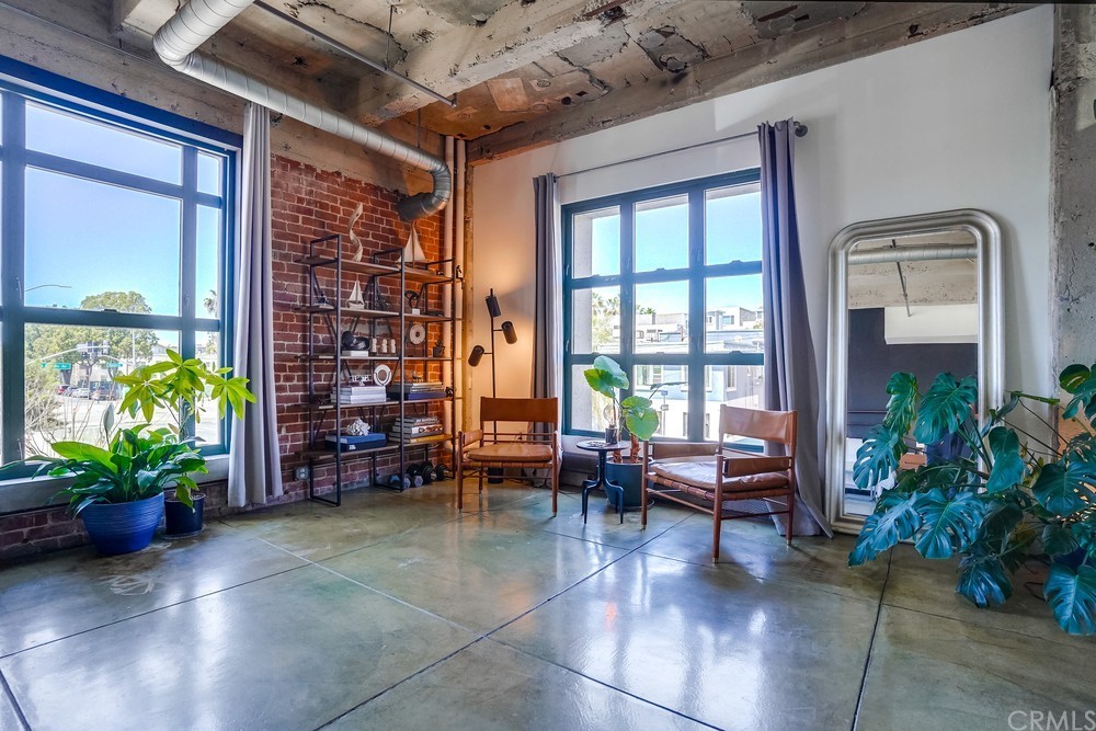 100 West 5th Street Long Beach, CA 90802 - Photo 40 of 53 a lobby with furniture and potted plants