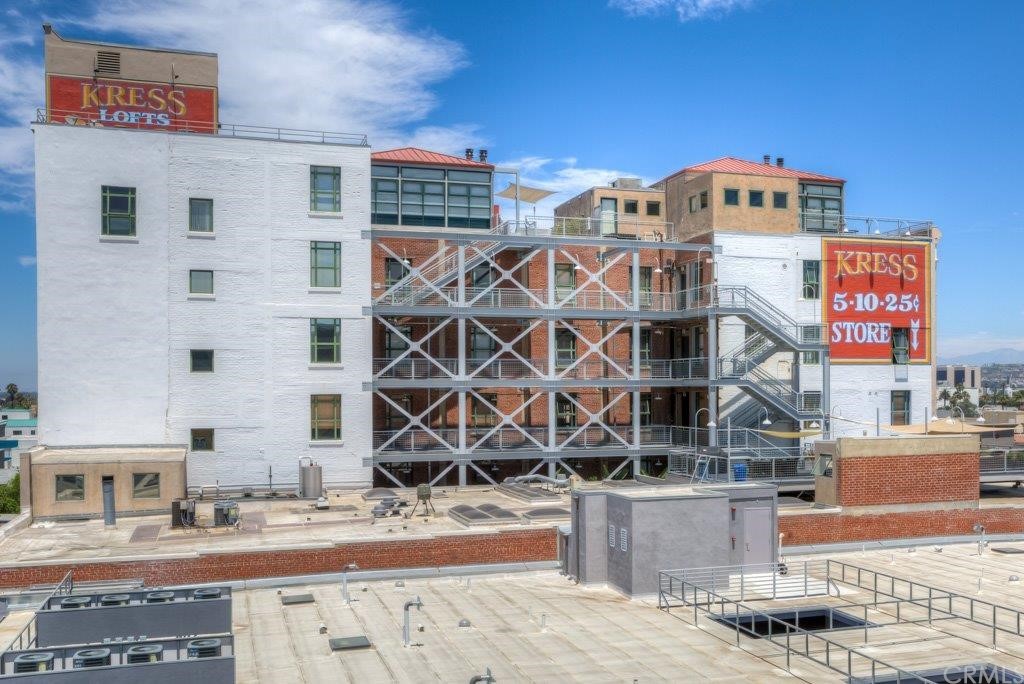 100 West 5th Street Long Beach, CA 90802 - Photo 4 of 53 a front view of a building with a street