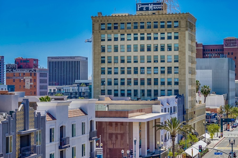 100 West 5th Street Long Beach, CA 90802 - Photo 47 of 53 a front view of a building with glass windows