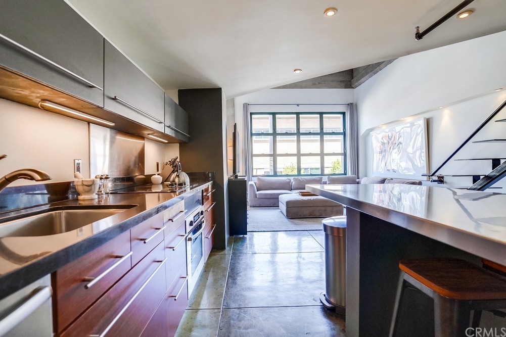 100 West 5th Street Long Beach, CA 90802 - Photo 9 of 53 a large kitchen with a large window