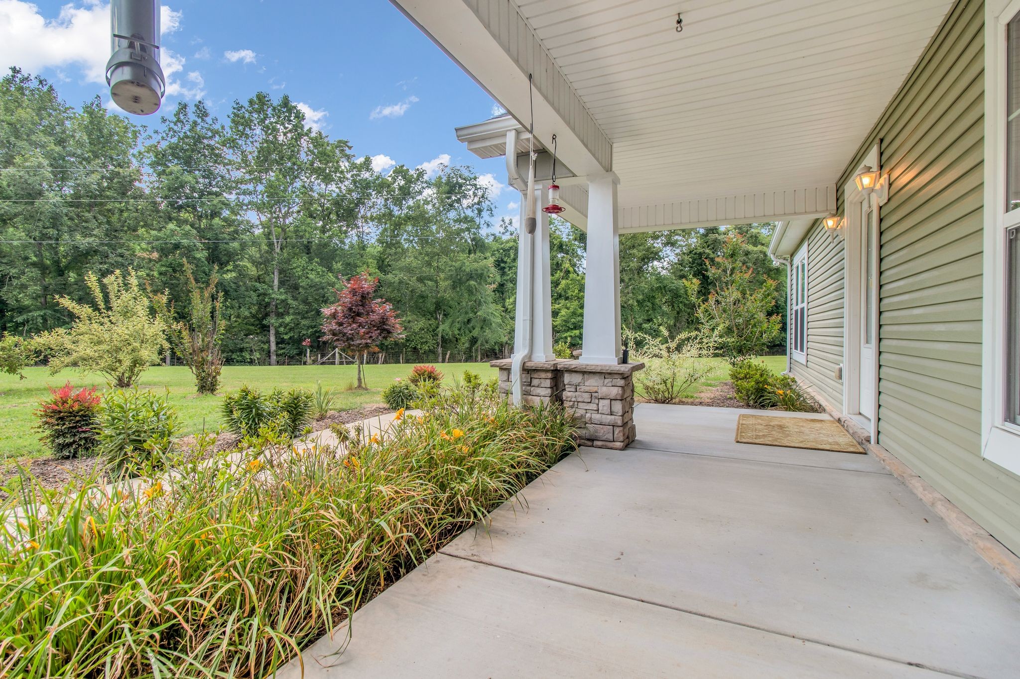 1166 Perry Road Manchester, TN 37355 - Photo 3 of 40 a view of an outdoor space with a garden
