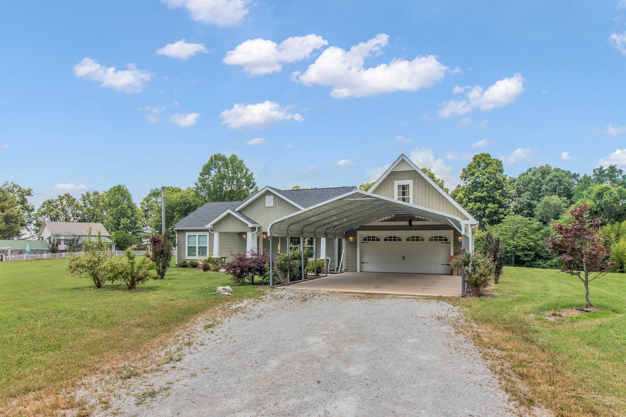 1166 Perry Road Manchester, TN 37355 - Photo 40 of 40 a front view of a house with garden