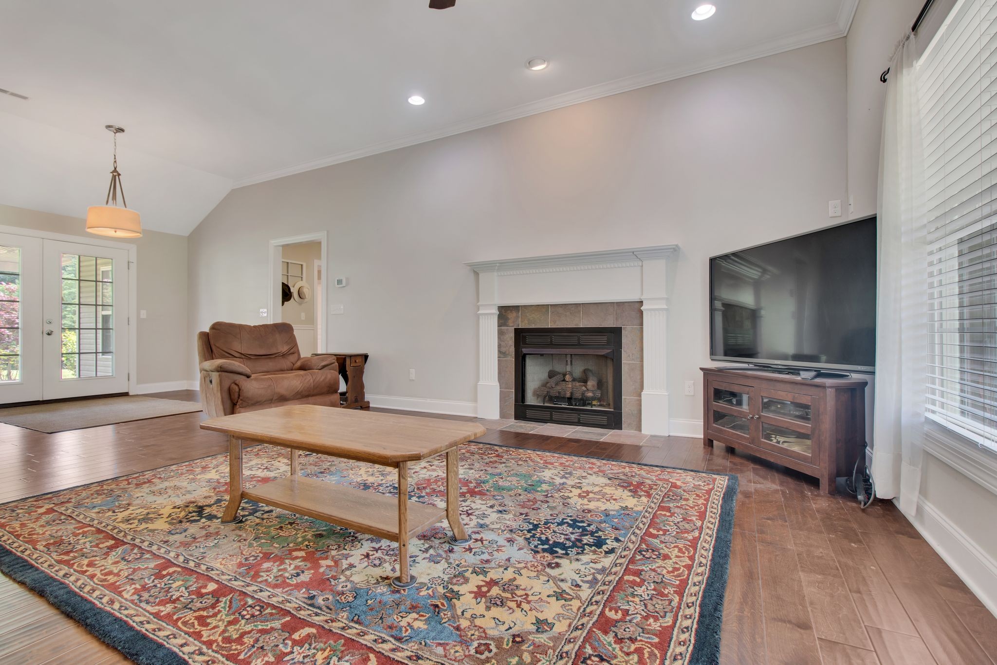 1166 Perry Road Manchester, TN 37355 - Photo 9 of 40 a living room with furniture and a fireplace