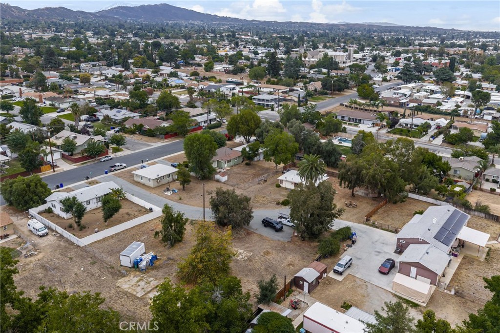 11870 3rd Street Yucaipa, CA 92399 - Photo 18 of 18 an aerial view of residential houses with outdoor space