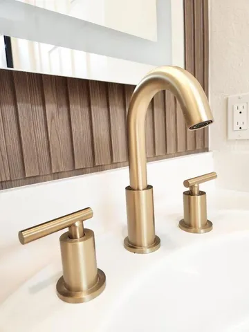 a bathroom with a glass shower door and a bathtub