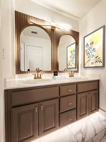 a bathroom with a toilet and a bathtub