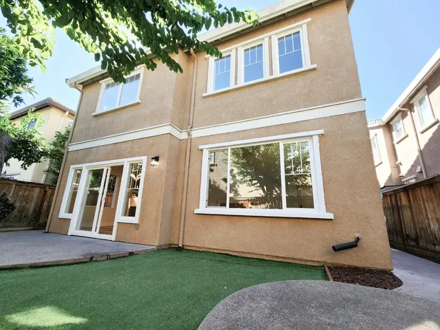 a view of a park with swings and slides