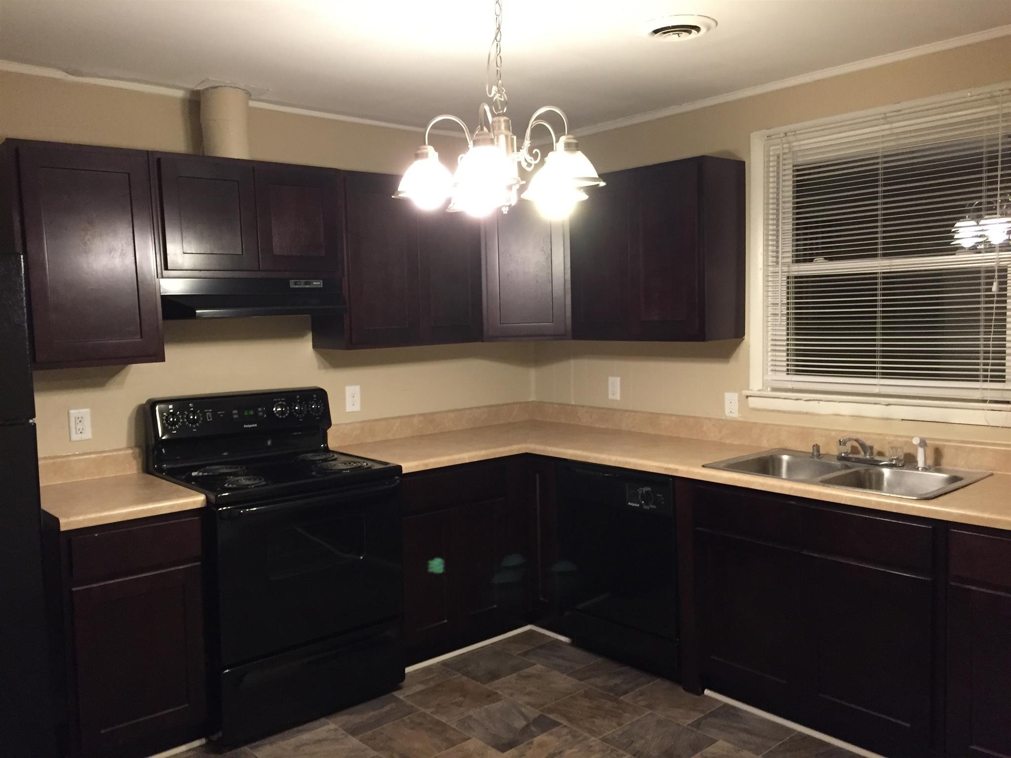 1302 Atlas Street Murfreesboro, TN 37130 - Photo 2 of 10 a kitchen with a sink and a window