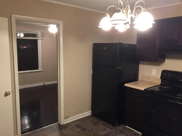 a bathroom with a sink vanity and mirror