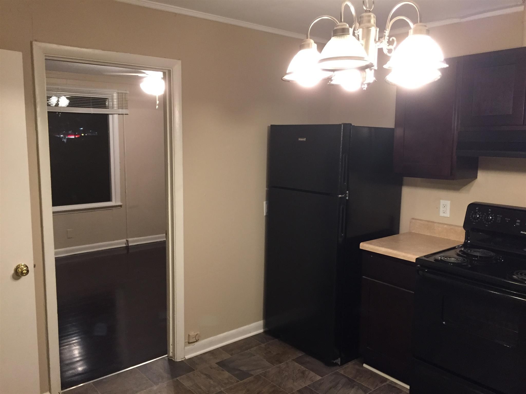 1302 Atlas Street Murfreesboro, TN 37130 - Photo 5 of 10 en suite bathroom with a light fixture and a sink