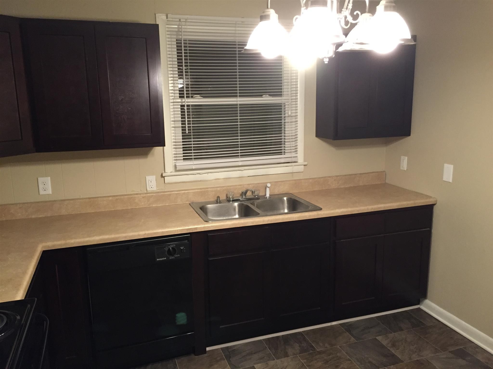 1302 Atlas Street Murfreesboro, TN 37130 - Photo 6 of 10 a bathroom with a sink vanity and mirror