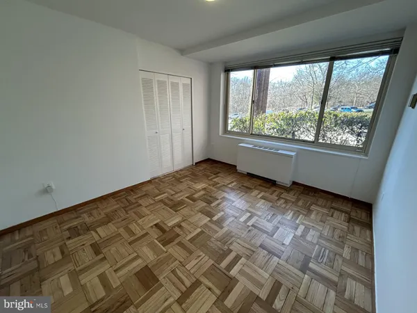 en empty room with windows