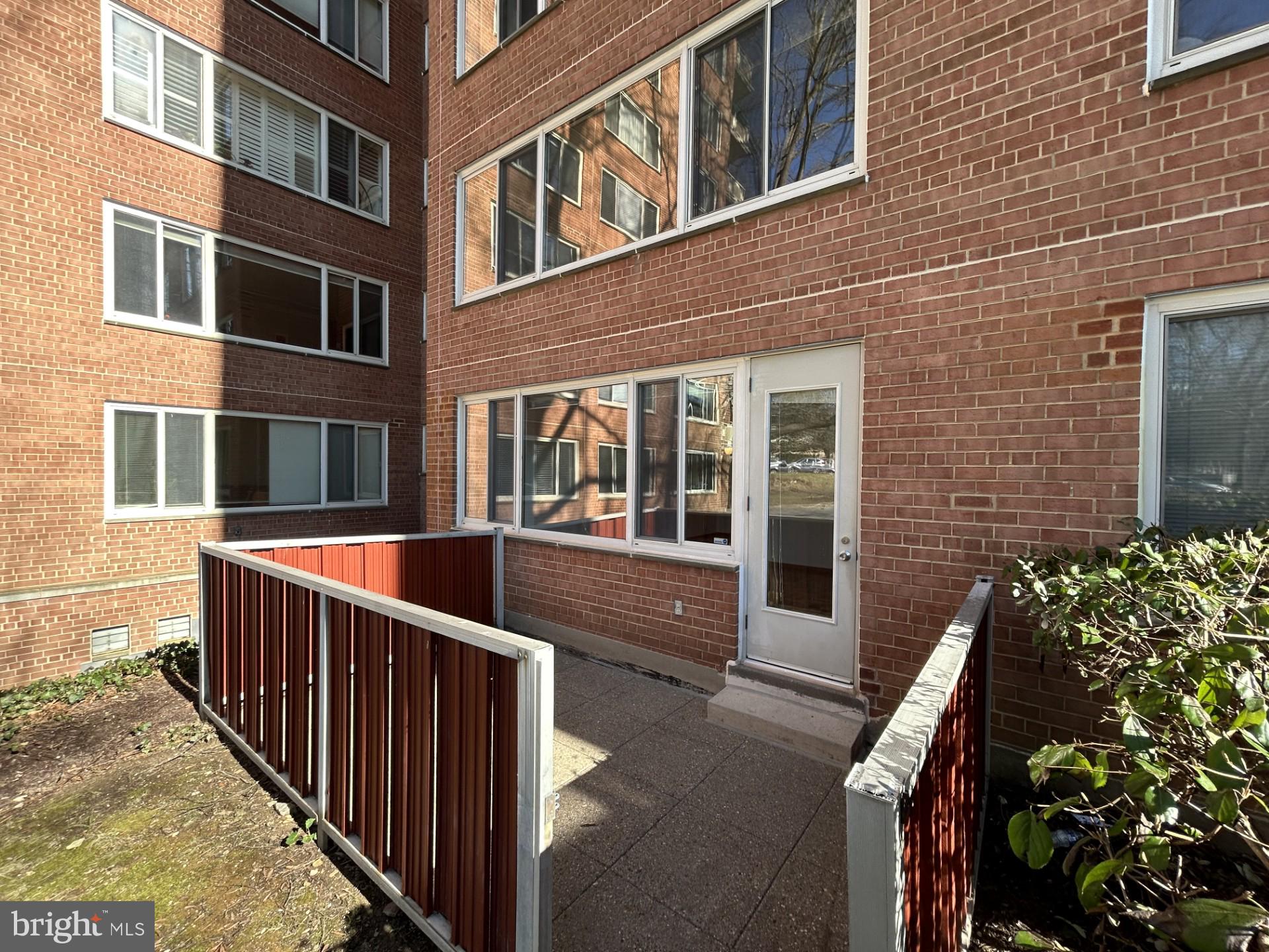 4000 Tunlaw Road Northwest, Unit 223 Washington, DC 20007 - Photo 17 of 28 a view of a building from a balcony