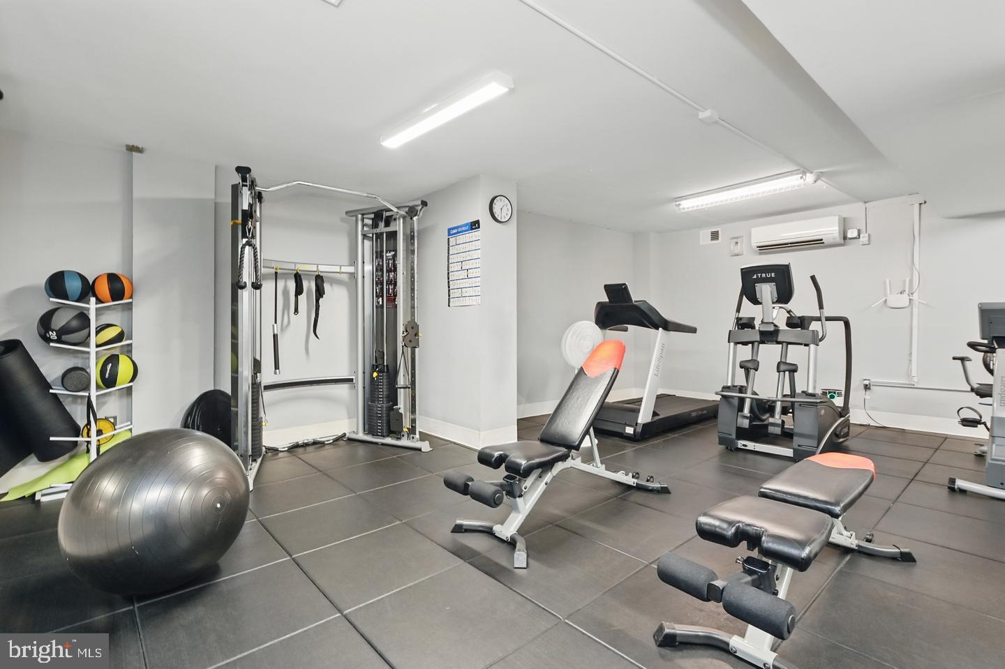 4000 Tunlaw Road Northwest, Unit 223 Washington, DC 20007 - Photo 22 of 28 a room with gym equipment