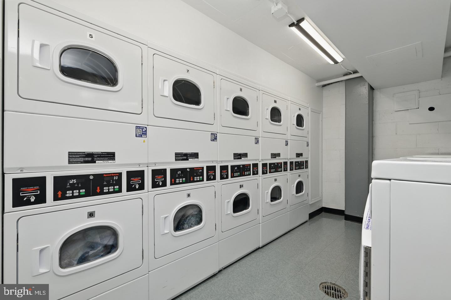 4000 Tunlaw Road Northwest, Unit 223 Washington, DC 20007 - Photo 23 of 28 a view of kitchen with washer and dryer