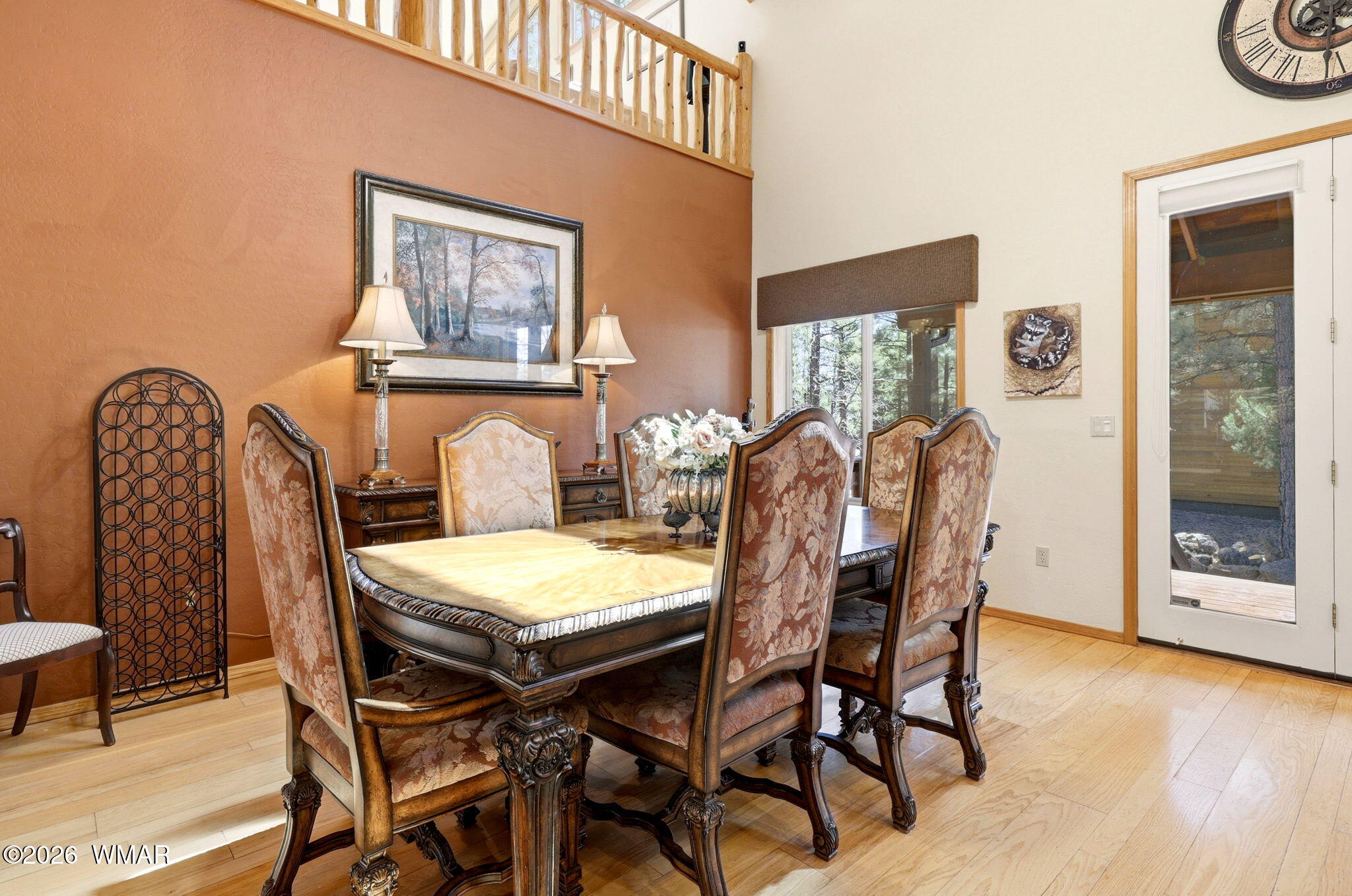 826 Pine Creek Circle Lakeside, AZ 85929 - Photo 10 of 65 a view of a dining room with furniture and wooden floor