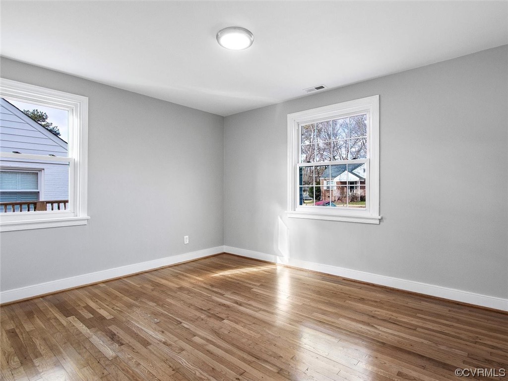 6903 Everview Road Richmond, VA 23226 - Photo 26 of 34 a view of empty room with wooden floor and fan