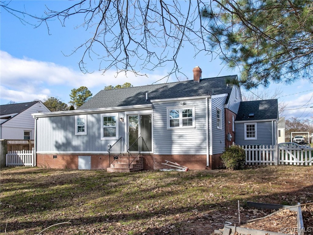 6903 Everview Road Richmond, VA 23226 - Photo 34 of 34 a front view of a house with a yard