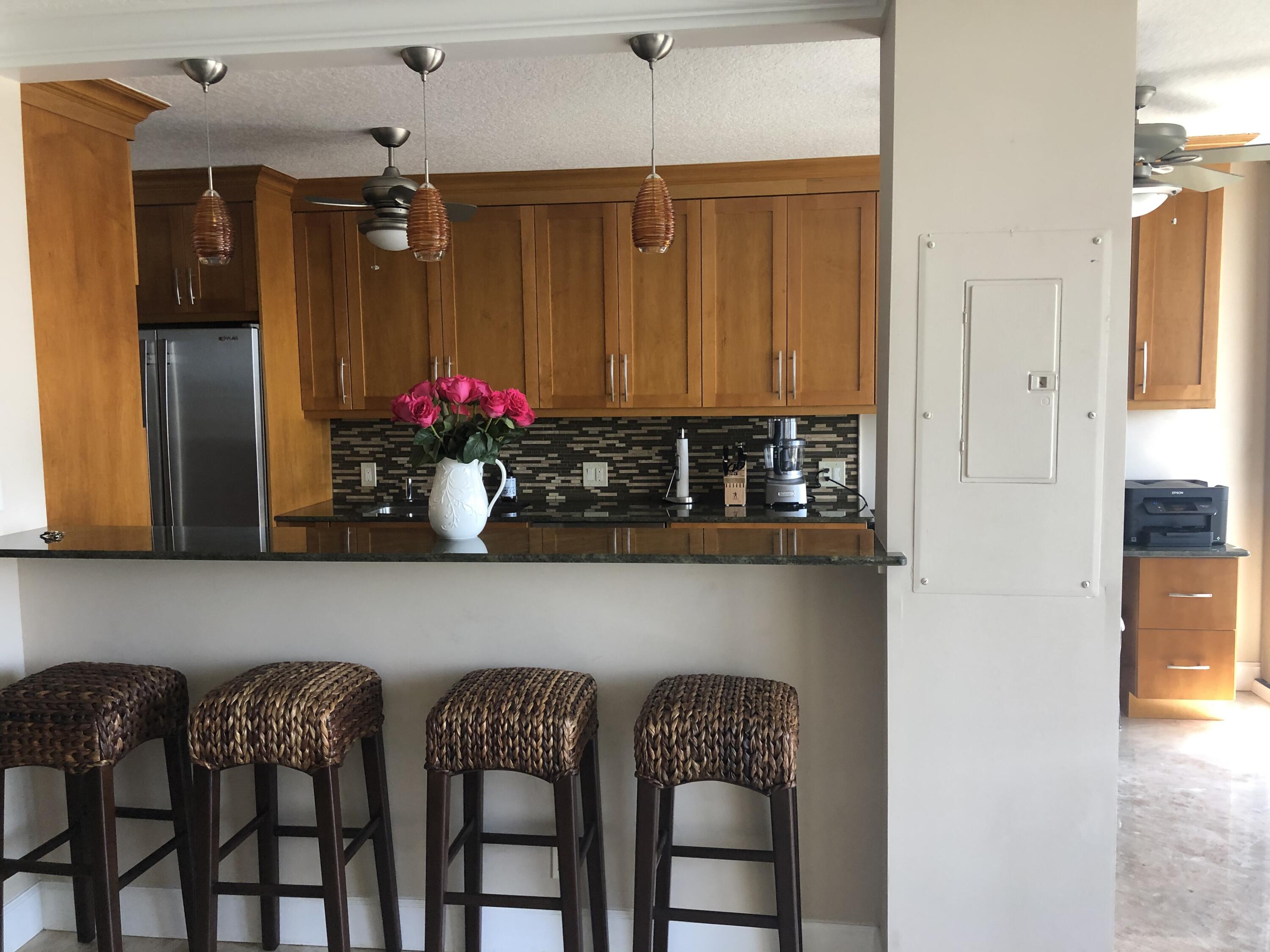 3400 North Ocean Drive, Unit 1506 Riviera Beach, FL 33404 - Photo 6 of 42 Opening Between Living Room & Kitchen