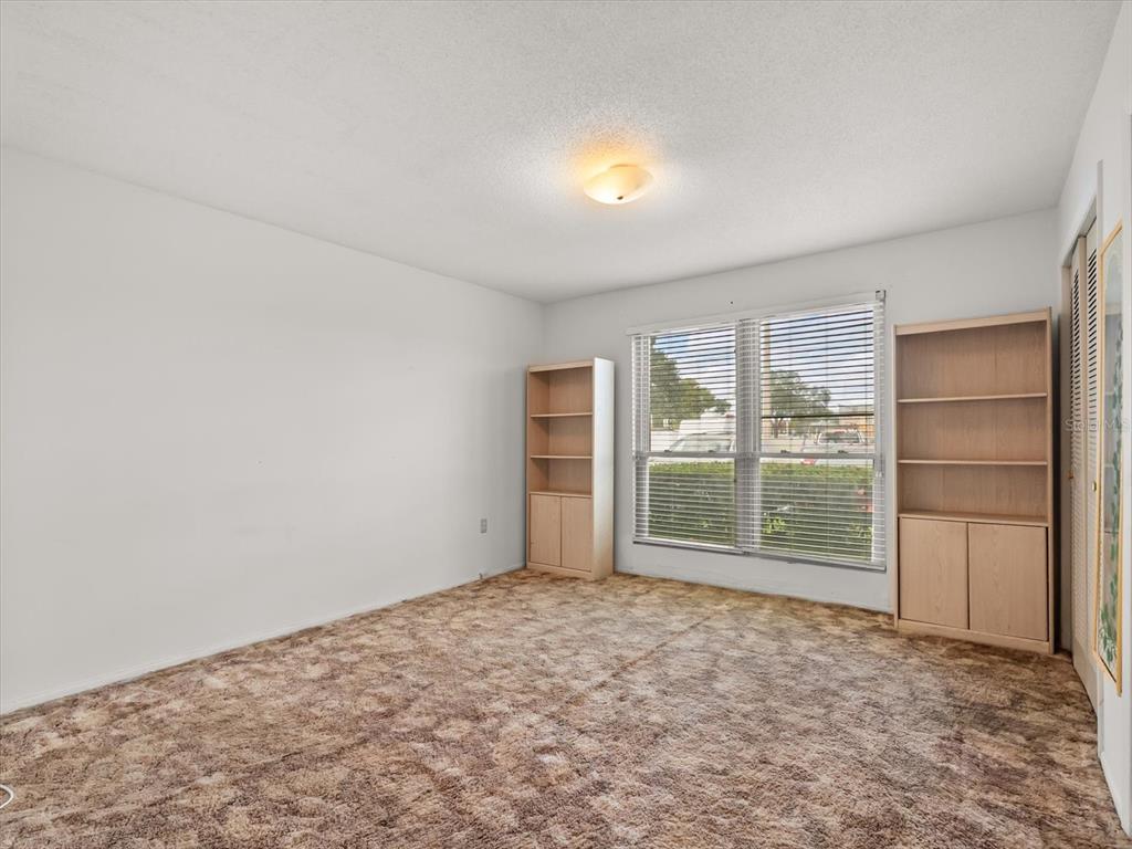 1935 South Conway Road, Unit L3 Orlando, FL 32812 - Photo 14 of 29 an empty room with a empty space and windows